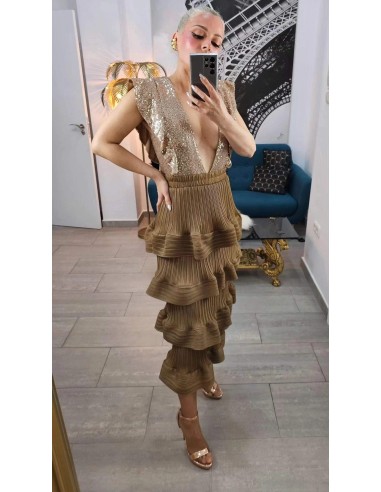 Falda midi de volantes con tejido satinado plisado. Cinturilla elástica. Talla desde 36 hasta 48.