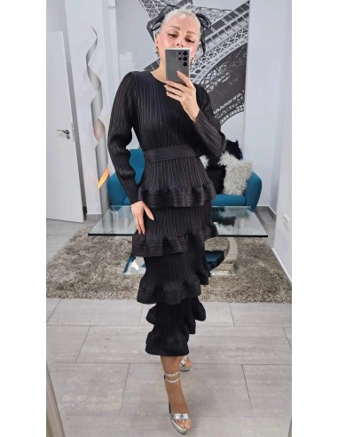 Falda midi de volantes con tejido satinado plisado. Cinturilla elástica. Talla desde 36 hasta 48.
