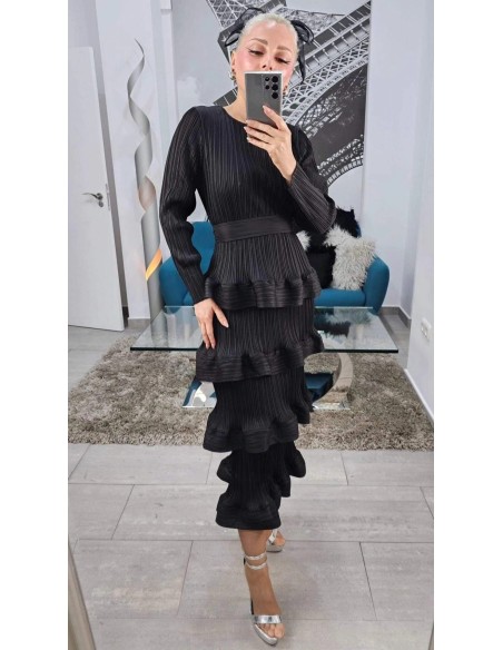 Falda midi de volantes con tejido satinado plisado. Cinturilla elástica. Talla desde 36 hasta 48.