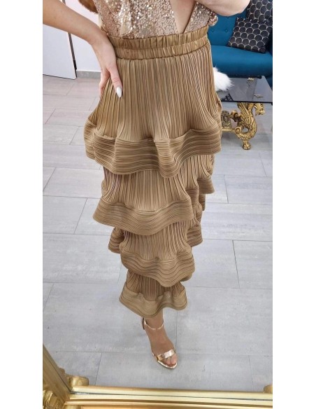 Falda midi de volantes con tejido satinado plisado. Cinturilla elástica. Talla desde 36 hasta 48.