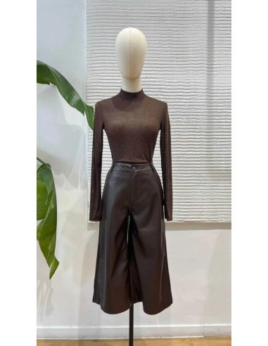 Body en transparencia con cuello perkins y pedrería.