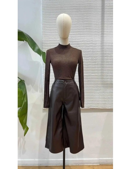 Body en transparencia con cuello perkins y pedrería.