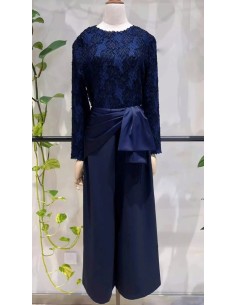 Pantalón corte cropped en tejido fluido con detalle de lazada en cintura satinada. 2