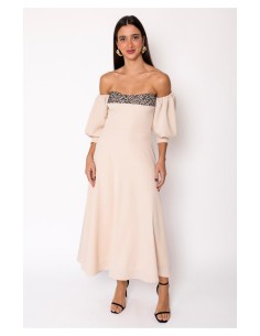 Vestido midi de vuelo con escote bardot y manga francesa abullonada. Cierre mediante cremallera invisible trasera.
