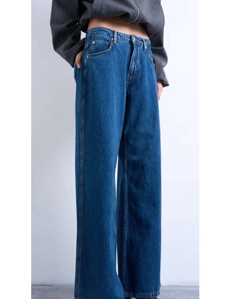 Jeans de tiro alto palazzo en tejido azul oscuro y cinco bolsillos. Tejido elástico.