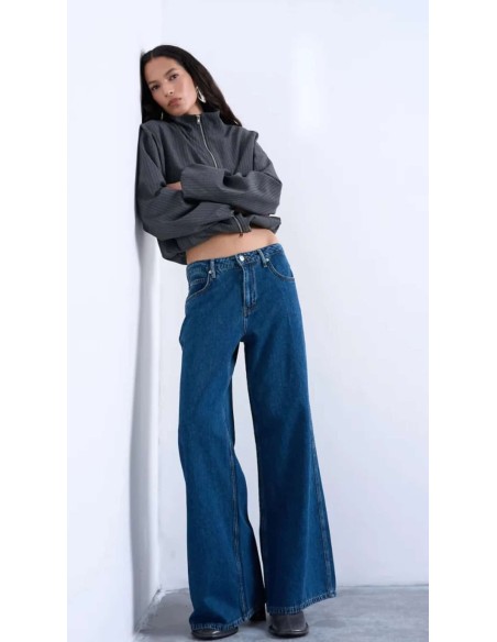 Jeans de tiro alto palazzo en tejido azul oscuro y cinco bolsillos. Tejido elástico.
