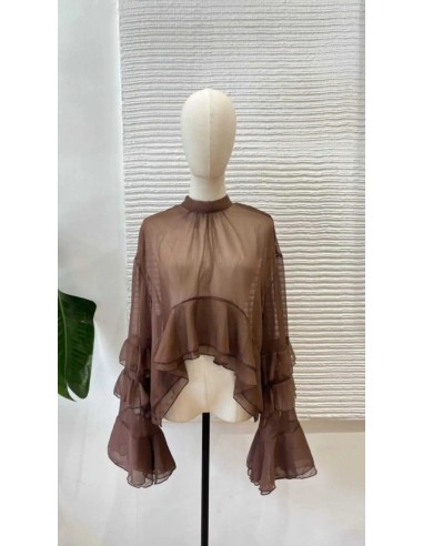 Camisa con mangas volantes y lazada en el cuello al mejor precio de nueva colección otoño invierno.