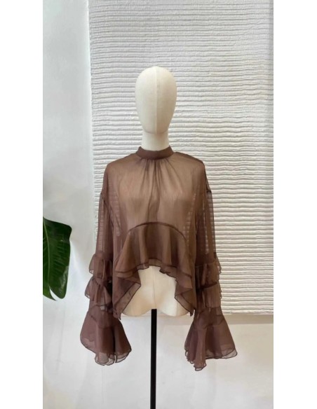 Camisa con mangas volantes y lazada en el cuello al mejor precio de nueva colección otoño invierno.