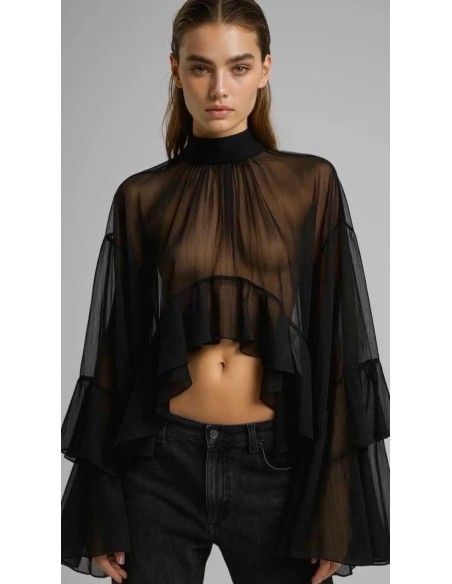 Camisa con mangas volantes y lazada en el cuello al mejor precio de nueva colección otoño invierno.