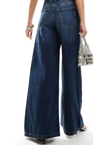 Jeans de tiro alto palazzo en tejido azul oscuro y cinco bolsillos. Tejido elástico.
