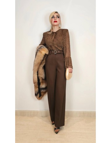 Pantalón palazzo con detalle de bolsillos traseros. La mejor calidad al mejor precio de última temporada.