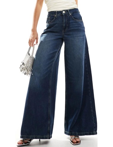 Jeans de tiro alto palazzo en tejido azul oscuro y cinco bolsillos. Tejido elástico.